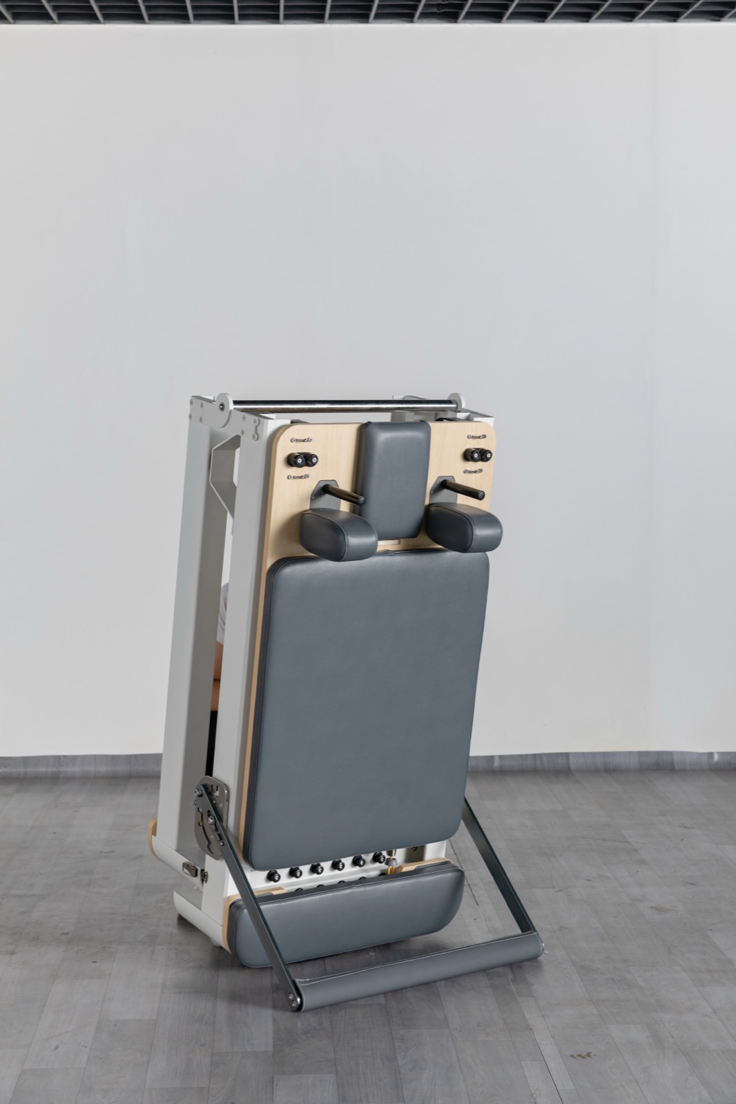 Space-saving aluminum folding Pilates reformer equipment for compact studio storage view 4
